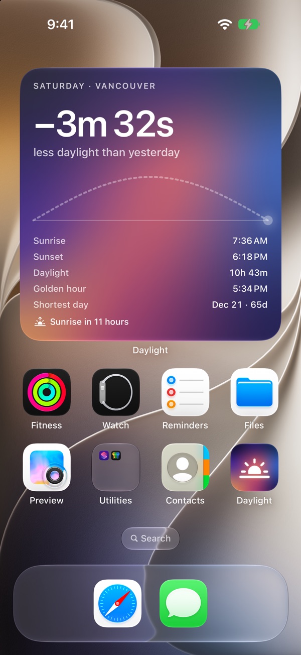 An iPhone Home Screen with the large Daylight Glow widget: minus 3 minutes 32 seconds, the sun's path, sunrise, sunset, golden hour and the shortest day.